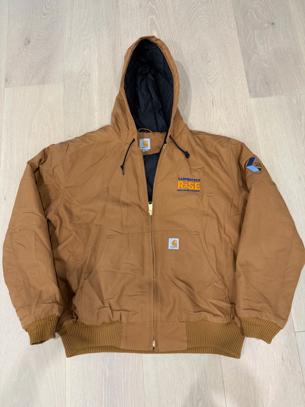 Carhartt hooded jacket with cozy interior liner